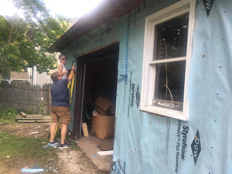 Habitat for Humanity of McHenry County volunteers work on a home in Wonder Lake.