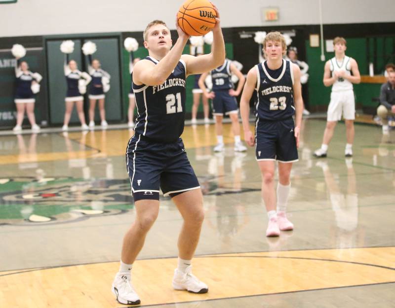 Fieldcrest's Jackson Hakes shoots a free-throw against Midland on Wednesday, Feb. 19, 2025 at Midland High School.