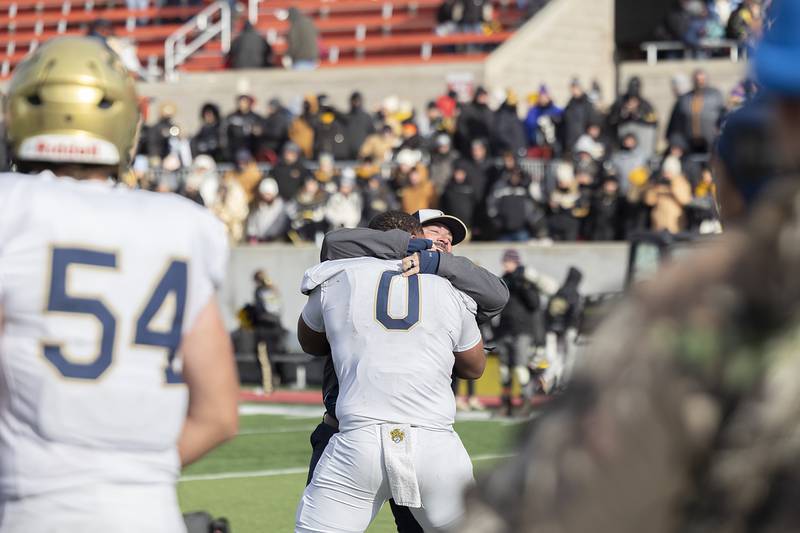 Althoff Catholic celebrates their win over Lena-Winslow Friday, Nov. 29, 2024, in the class 1A football state final.
