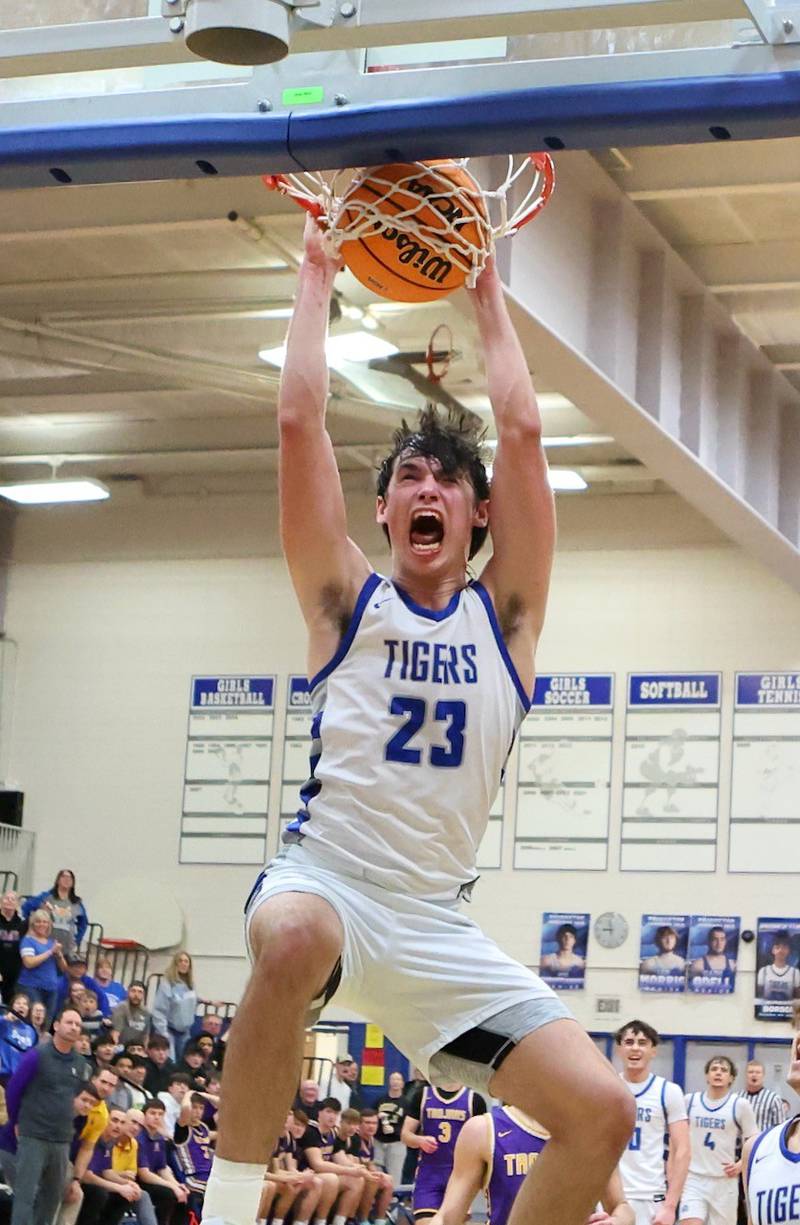 Princeton's Noah LaPorte throws down a dunk to give the Tigers a 49-44 lead late in Wednesday's regional semifinal game against Mendota at Prouty Gym. The Tigers won 54-47.