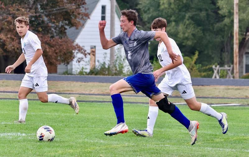 Princeton's Tyler VanDeventer runs down the ball in Saturday's regional quarterfinal soccer match vs. Stanford Olympia at Bryant Field. The Tigers won 6-2.