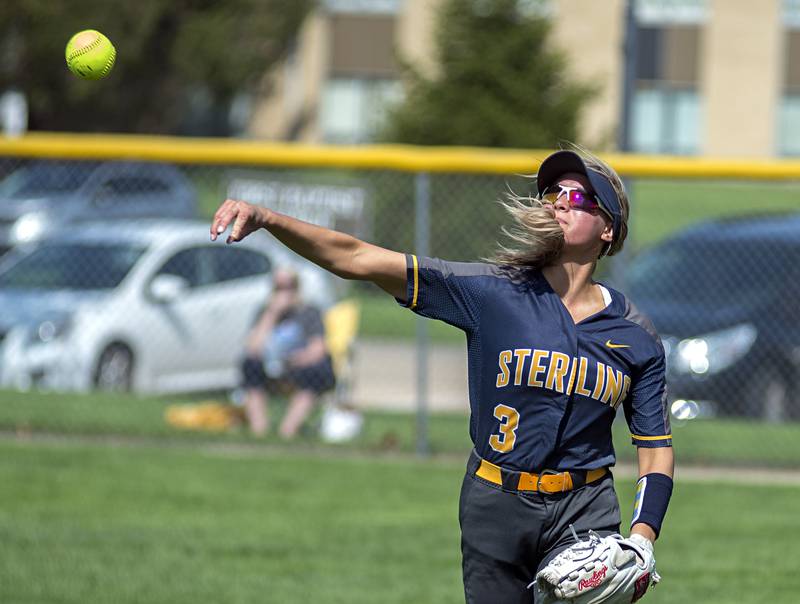 Sterling’s Julia Thormeyer throws the ball in from right field Monday, April 9, 2022 against United Township.