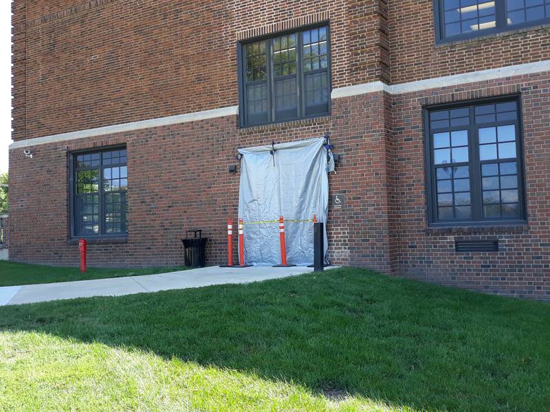 An entrance into Ottawa High School from the west side of the school was damaged.