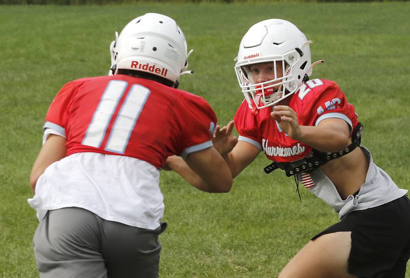 Marian Central’s Mike Schmid (right) plays pass defense against Eddie Kowalczyk during football practice on Tuesday, August 19, 2025, at Marian Central  High School in Woodstock.
