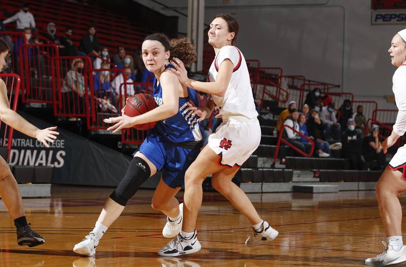 Aurora University guard and Genoa-Kingston Julie Galauner drives to the hoop in a game earlier this season.