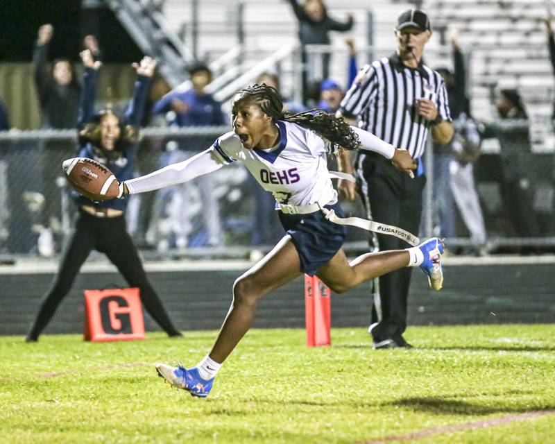 Oswego East's Avaya Kittling-turner (3) scores the winning touchdown during Oswego East Regional Final flag football game between St. Charles North at Oswego East Thursday, Oct 9, 2025 in Oswego.