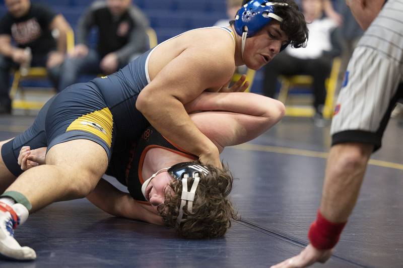 Sterling’s Diego Leal pins Jordan Patz in the 195 pound third place match at the Sterling wrestling regional.
