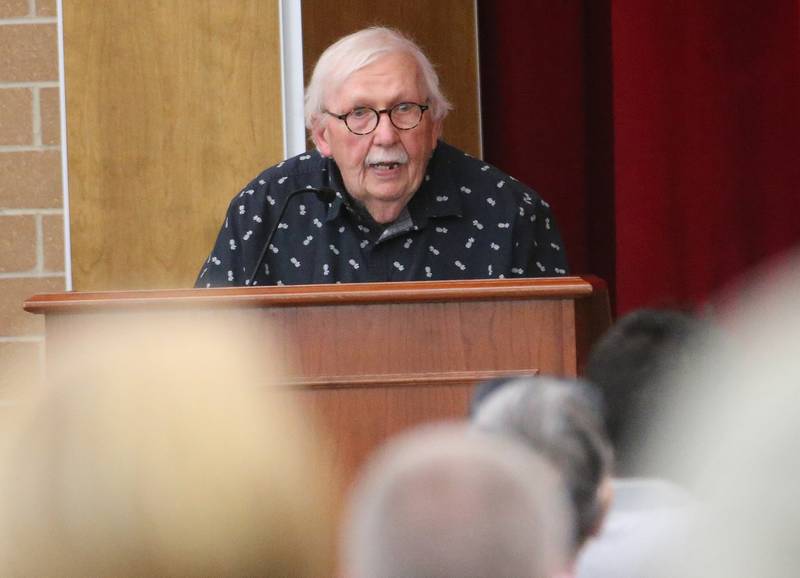 James Prendergast, a retired teacher speaks to the Illinois Health Facilities and Services Review Board during a public hearing regarding OSF St. Elizabeth Hospital's plans to reduce services on Tuesday, June 10, at Central Intermediate School in Ottawa.