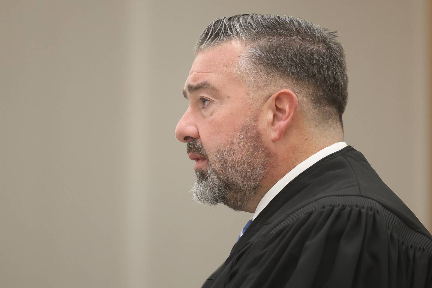 Judge Dave Carlson talks to Kyleigh Cleveland-Singleton during her arraignment on obstruction of justice charges in connection with the Romeo Nance mass shooting at the Will County Courthouse on Thursday, Feb. 8th 2024 in Joliet.