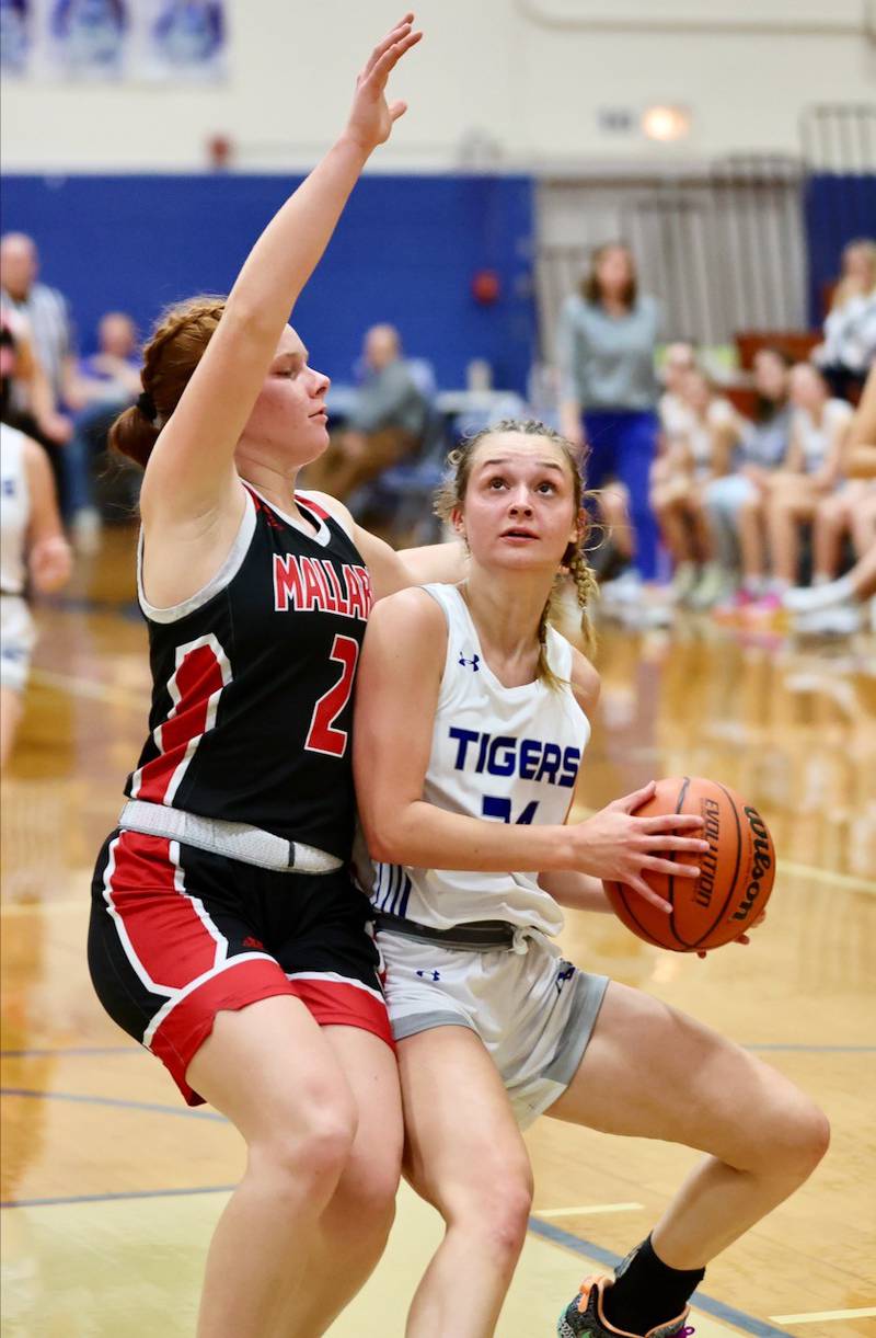 Princeton's Keighley Davis posts up on Henry's Brynna Anderson Tuesday night at Prouty Gym.
