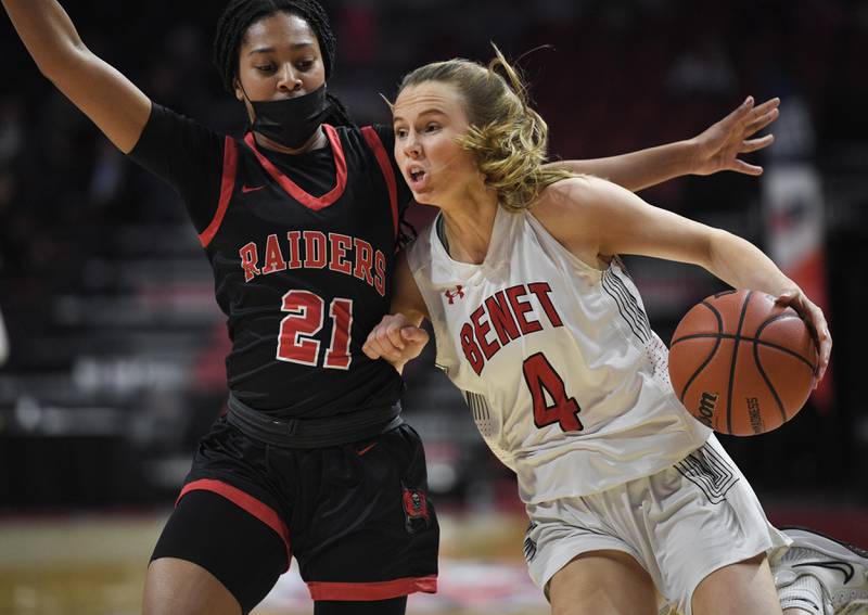 Benet Academy’s Lenee Beaumont drives against Bolingbrook's Persais Williams in the Class 4A state 3rd place game at Redbird Arena at Illinois State University in Normal on Friday, March 4, 2022.