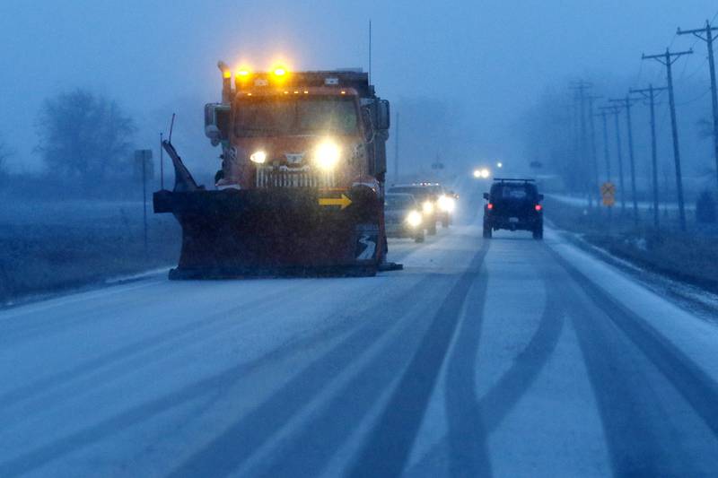 Traffic follows a snowplow on Wednesday, Jan. 22, 2025, near the intersection of Illinois Route 173 and Keystone Road.