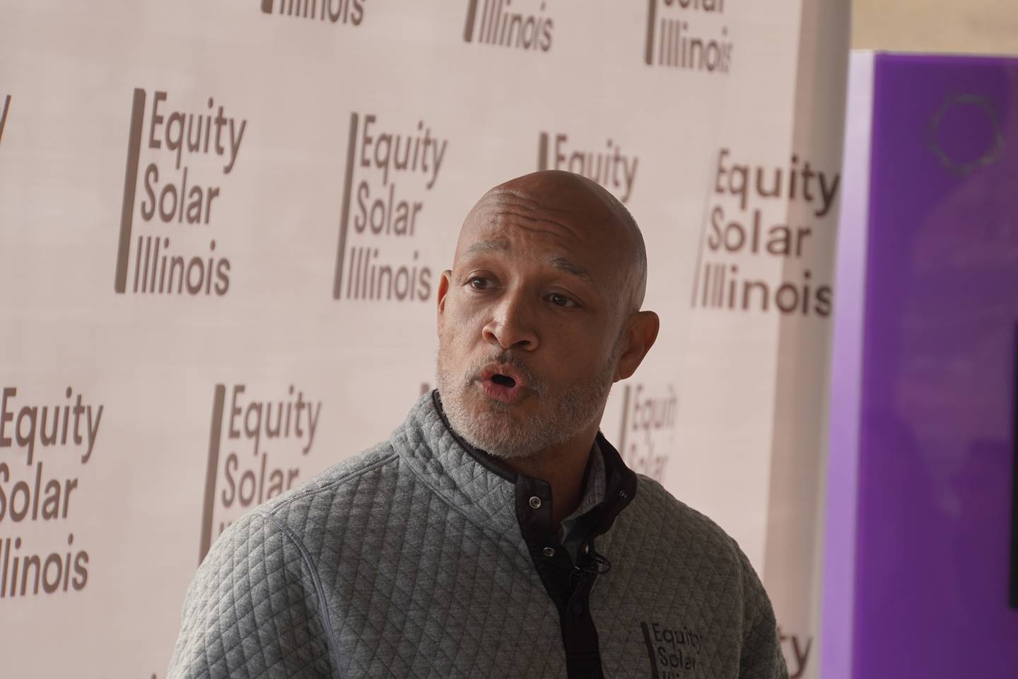 Equity Solar Illinois Principal Marcellus Moore speaks at a ribbon cutting for a new community solar project in Oregon on Thursday, Oct. 30, 2025.