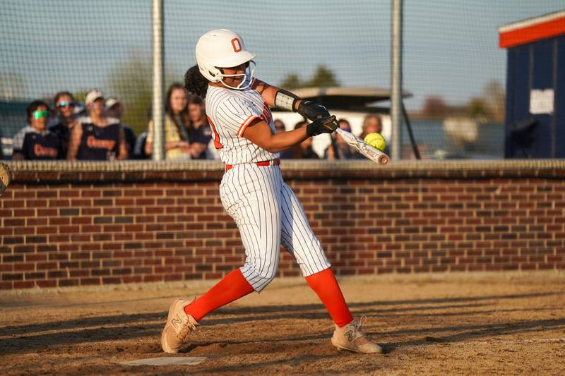 Oswego’s Jaelynn Anthony (20) homers against Minooka during a Southwest Prairie Conference softball game at Oswego High School on Wednesday, April 23, 2025.
