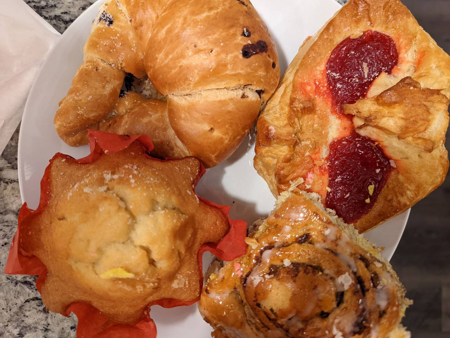 La Chicanita Bakery in Crest Hill offers a wide variety of homemade breads and pastries, juices, sandwiches and custom cakes. Pictured, clockwise, is a chocolate croissant, fruit and cheese danish, anise-flavored coffee cake and a lemon muffin.