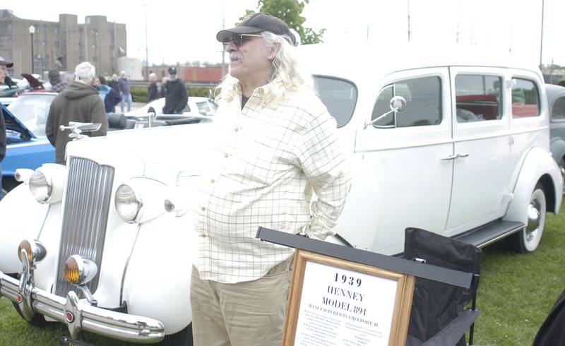 Chris Dulaney stands next to his '39 Henney Ambulance. Sterling Main Street's 12th Annual Car Show took place at the Sterling Marketplace on Sunday, May 4th, 2025.