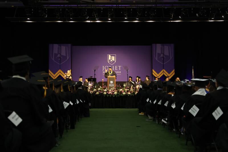 President Dr. Clyne Namuo gives opening remarks at the Joliet Junior College Commencement Ceremony on Friday, May 19, 2023, in Joliet.