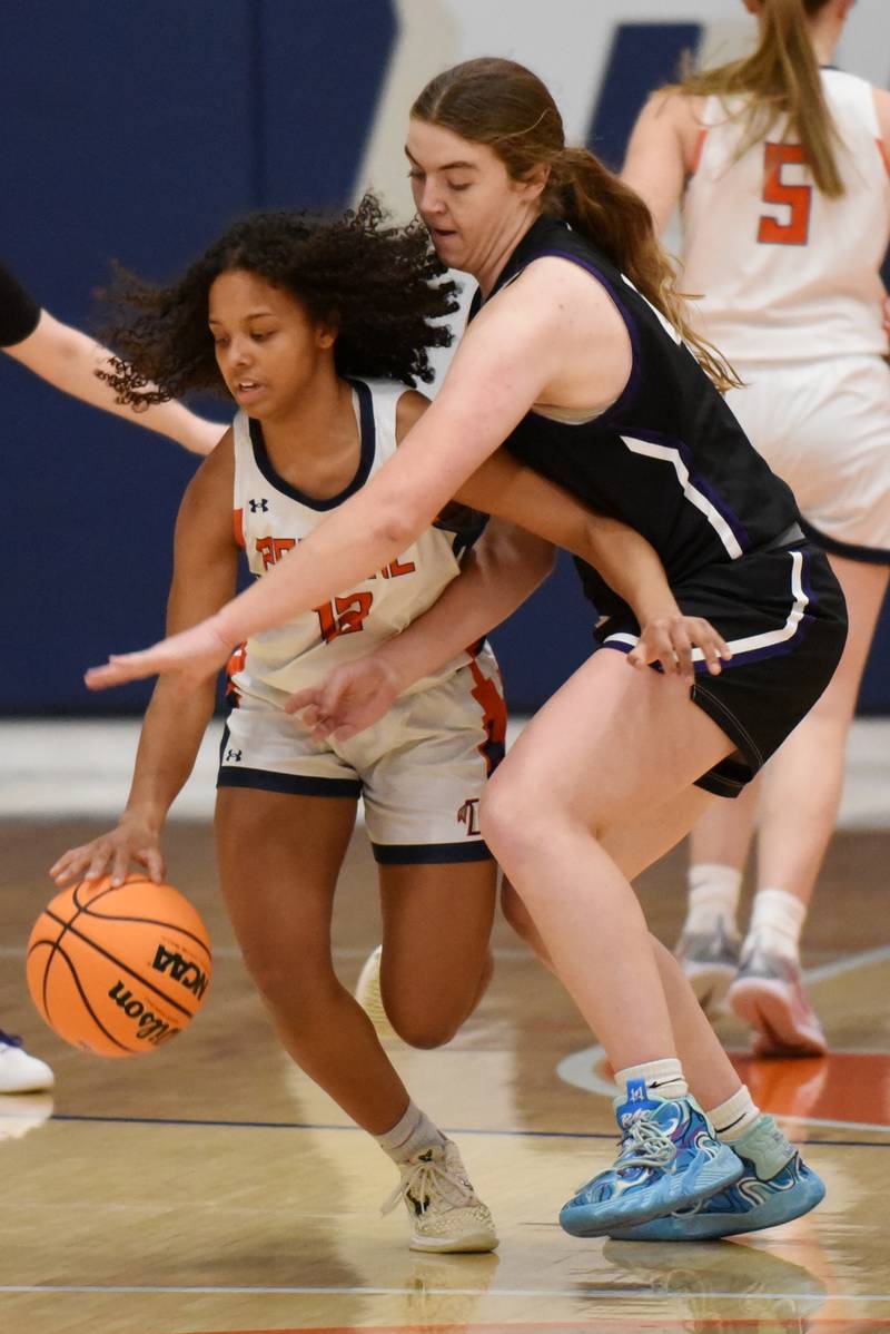 Manteno's Emily Horath, right, looks to steal the ball from Pontiac's Araceli Serna during the IHSA Class 2A Pontiac Sectional championship Thursday, Feb. 26, 2026.