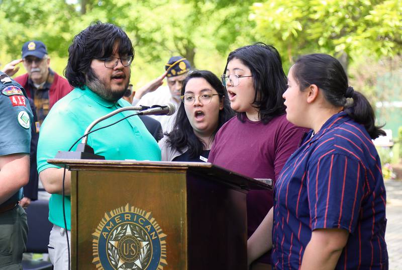 The Dripps Paulson siblings sing the Nationl Anthem at the Elburn American Legion Annual Memorial Day Observance at the Blackberry Township Cemetery on Monday, May 26, 2025.