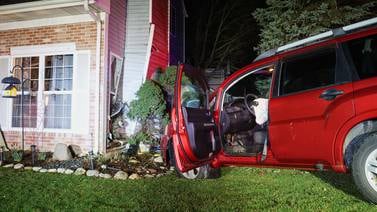 Man charged with DUI after crashing into Woodstock home within inches of where resident sat