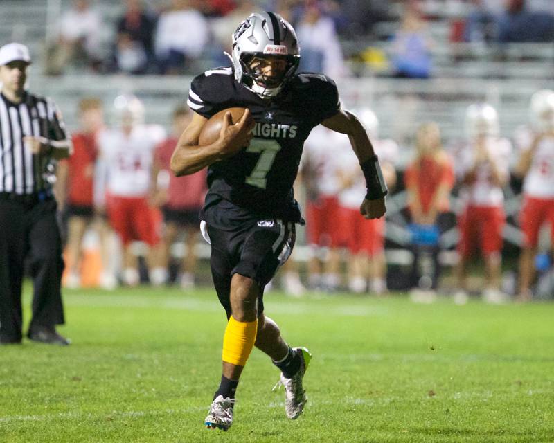 Kaneland's Jalen Carter carries the ball for a gain against Ottawa  on Friday, Sept. 19, 2025 in Maple Park.