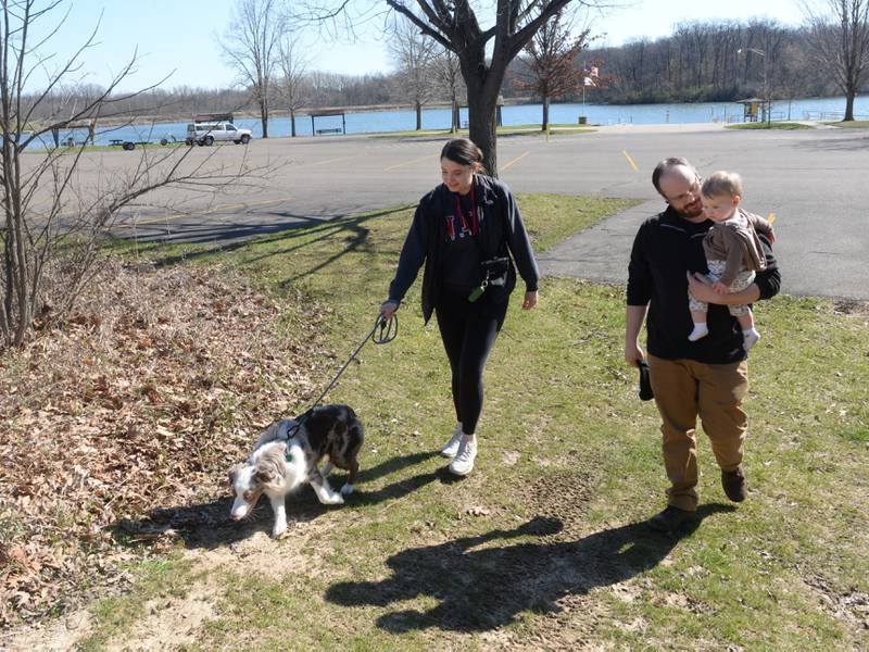 The Sibley family of Morrison took advantage od the sunshine Saturday, April 6, 2024 when they decided to go for a hike at Morrison Rockwood State Park. Here, Alyssa walks their nine-month-old puppy, Sammy, while Clay carries their one-year-old son, Clive.
