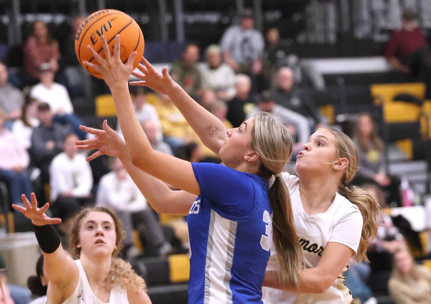 St. Francis' Téa Rubino gets up a shot in front of Sycamore's Quinn Carrier during their game Thursday, Jan. 4, 2023, at Sycamore High School.