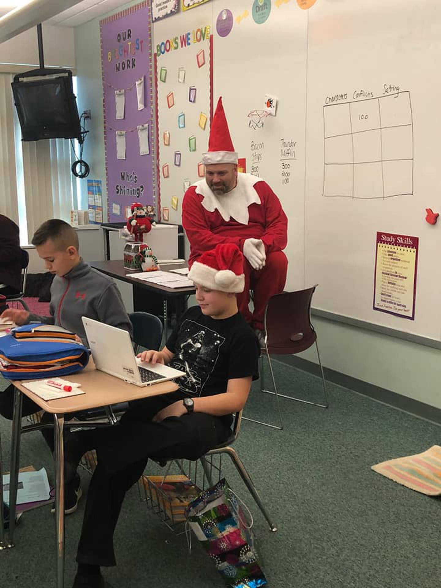 Morris Principal Dave Raffel sits on a desk as "Principal on a shelf".