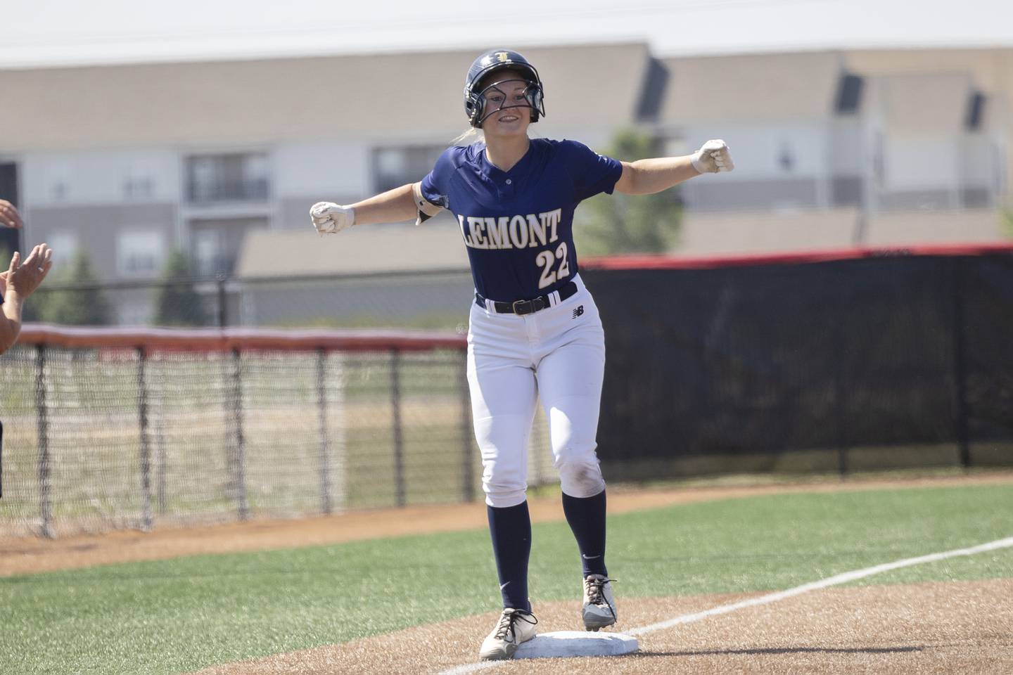 Lemont’s Avaree Taylor celebrates a triple against Benet Academy Friday, June 9, 2023 in the class 3A state softball semifinal.