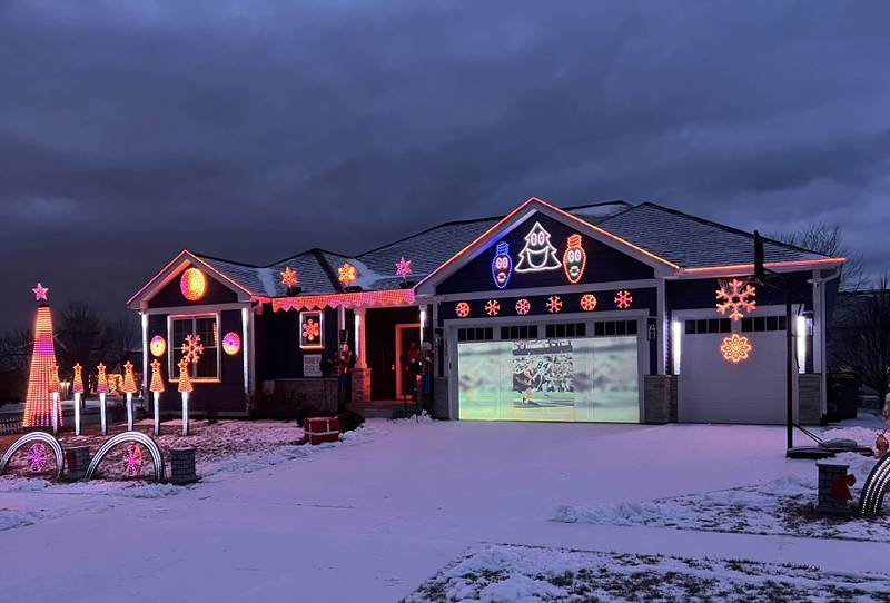A Chicago Bears light show put together by Tim Caravia and his family plays Friday, Jan. 16, 2025, at his home on Dustin Drive in Sycamore. The show will run from 5:30 to 9:00 p.m. most days until the Bears season ends.