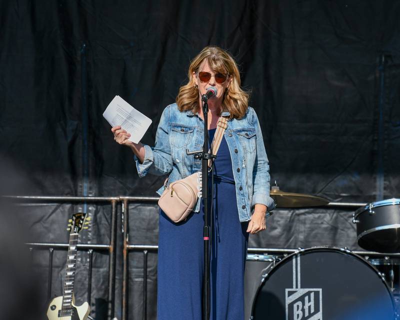 Christy Sopka of the Elmhurst City Center welcomes everyone who came out on Saturday May 31, 2025, during the Elmhurst Summer Kick Off Party held at City Centre Fountain Plaza in Elmhurst.