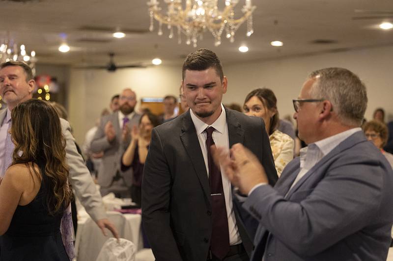 Ermir Ramadani heads to the stage to accept one of the 4 under 40 awards Friday, April 17, 2026, at the Best of Dixon celebration.