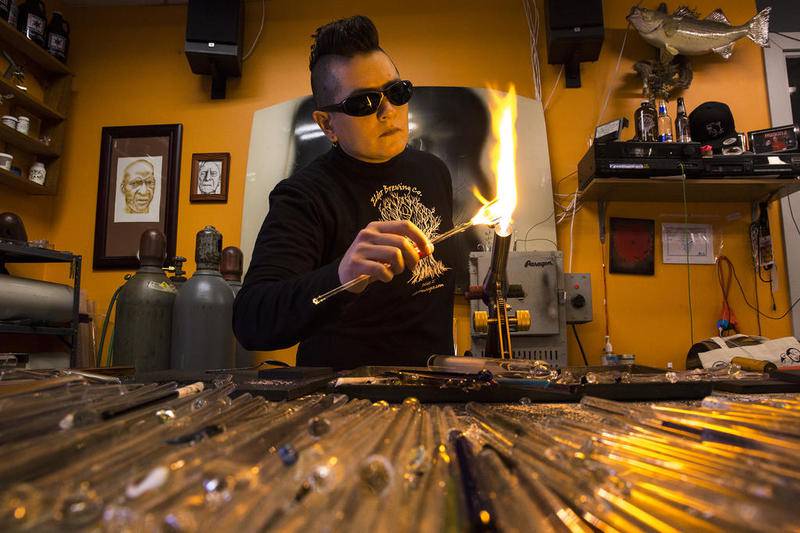 "It's all custom. It's not being mass produced in a factory. I love shop small, I'm all about supporting local and I love when people want to come spend money in small places in the community," says Sue Regis, owner of Sue Regis Glass Art on Wednesday, Nov. 21, 2018, in Joliet, Ill. Sue Regis Glass Art is one of the thousands of business across the nation participating is Small Business Saturday, an annual shopping holiday designed to celebrate and help discover small businesses.