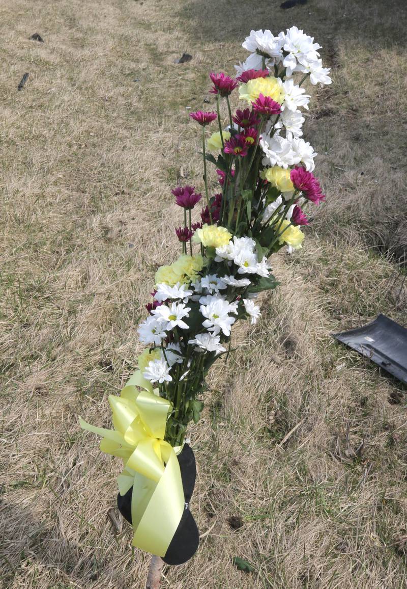A memorial has been put up Friday, March 29, 2024, at the site on Route 23 three-quarters of a mile south Perry Road, near DeKalb where DeKalb County Sheriff’s Deputy Christina Musil, 35, died in a crash while working a shift Thursday night.