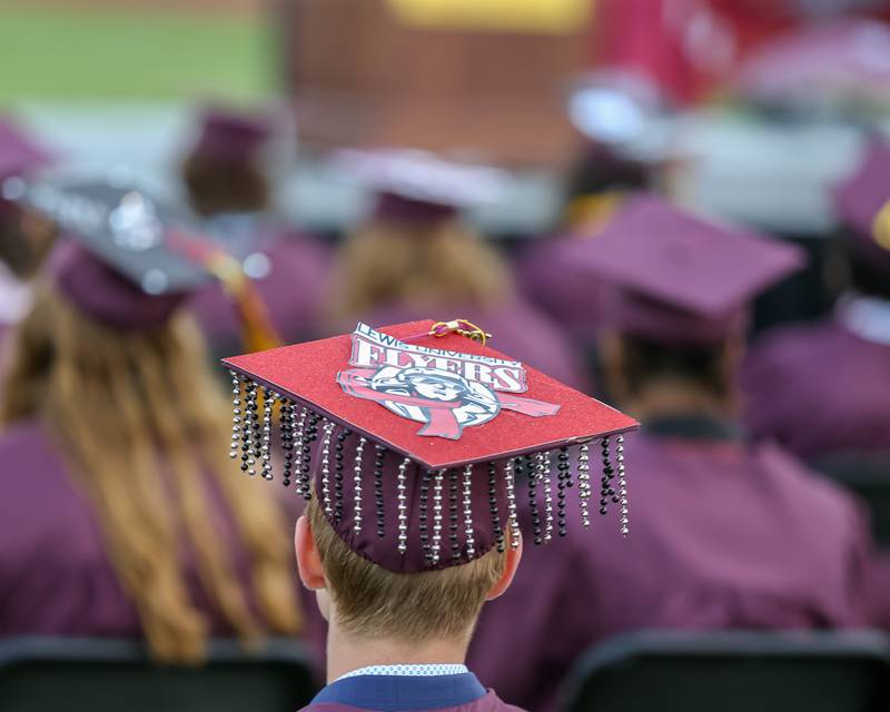 Cap decorations on display during the Westmont High School graduation ceremony. May 24, 2022