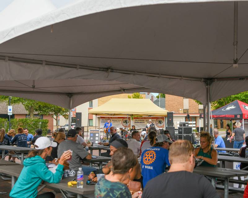 Community members enjoy food, drinks and live music during the Taste of DeKalb on Sunday, Sept. 29, 2024, held in DeKalb.