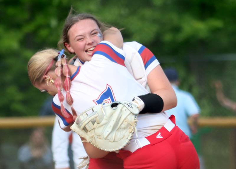 Morrison’s Bella Duncan and Allie Anderson embrace after the final out in a 6-1 win over Marengo in IHSA Class 2A Sectional Semifinal softball action at Marian Central High School in Woodstock on Thursday, May 29, 2025.
