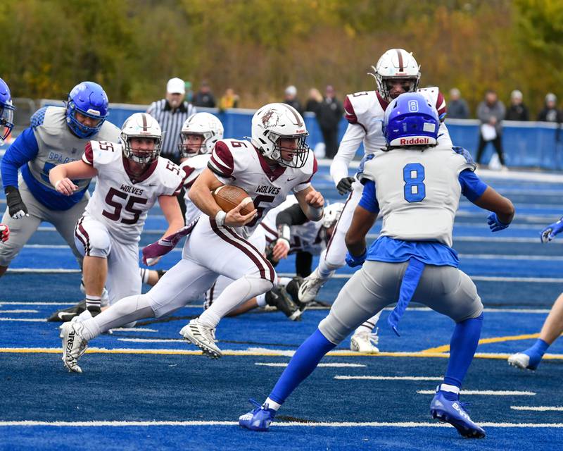 Prairie Ridge's Luke Vanderwiel (6) runs the ball while traveling to take on St. Francis during the second round of the 5A playoff game on Saturday Nov. 8, 2025, held at St. Francis's High School.