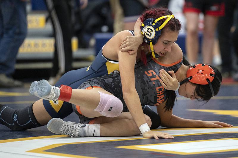 Sterling’s Katherine Garcia handles St. Charles’ Sophia Espinoza on Saturday, Dec. 7, 2024, at the Carson DeJarnatt Invitational in Sterling.