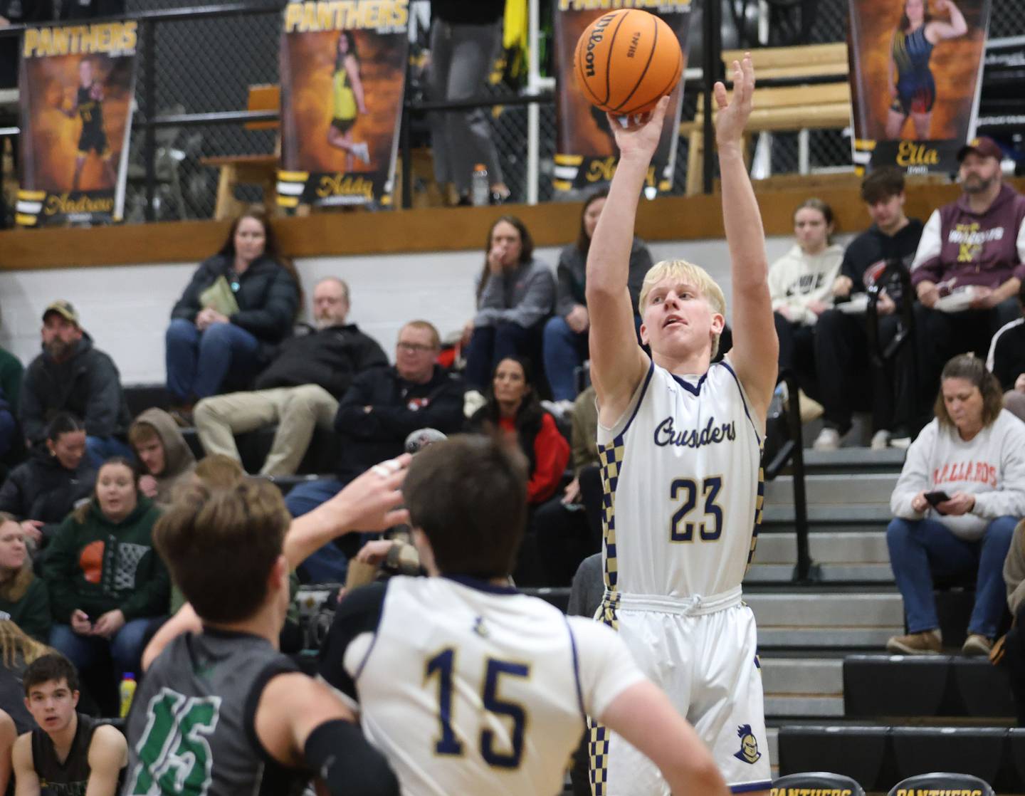 Marquette's Luke McCullough shoots a jump shot against Midland during the Tri-County Conference Tournament on Monday, Jan. 26, 2026 at Putnam County High School