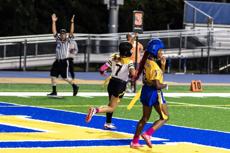 Joliet West's Mallory Crisafulli scores a touchdown during a varsity flag football game against Joliet Central at Joliet Central on Oct. 2, 2025.