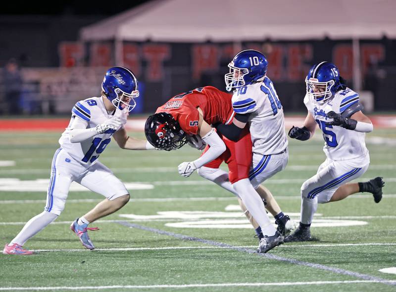 Riverside Brookfield's John Evans Jr. (10) tackles Glenbard East'sLucas Freese (5) during the varsity football game between Riverside Brookfield and Glenbard East on Friday, Oct. 24, 2025 in Lombard, IL.