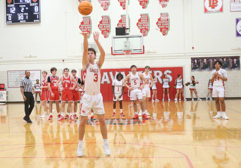 L-P's Mikey Hartman shoots free throws during a technical foul against Ottawa on Friday, Feb. 7, 2025 in Sellett Gymnasium at L-P High School.