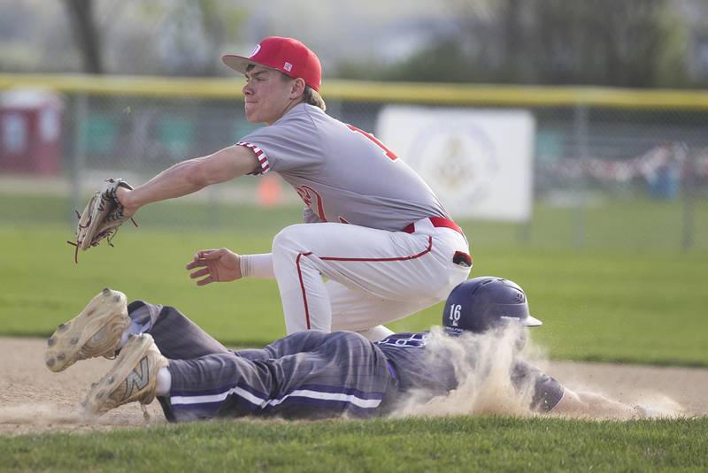 Dixon’s Jake Zepezauer dives but can’t beat the throw at first as Oregon’s Jackson Messenger takes the throw Thursday, April 23, 2026.