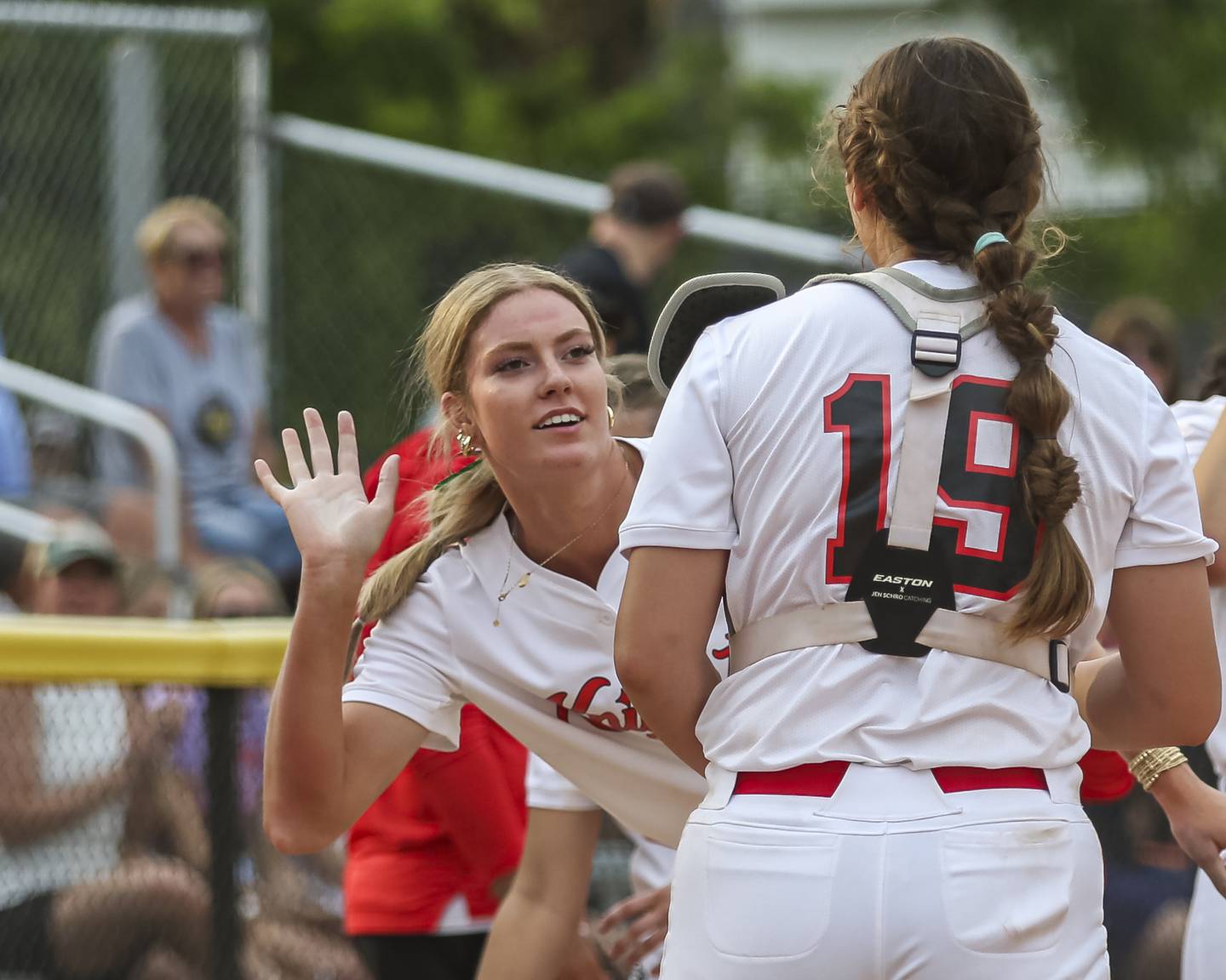 Lincoln-Way Central's Lisabella Dimitrijevic (13) celebrates with her team after beating Lincoln-Way West in their Class 4A Lockport sectional softball game on Tuesday, June 3, 2025 in Lockport.