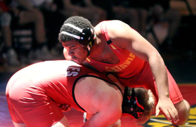 Batavia's Christian Allen (top) competes against Yorkville's Justin Wiesbrook in the 285-pound weight class in a dual meet at Batavia on Wednesday, Jan. 26, 2022.