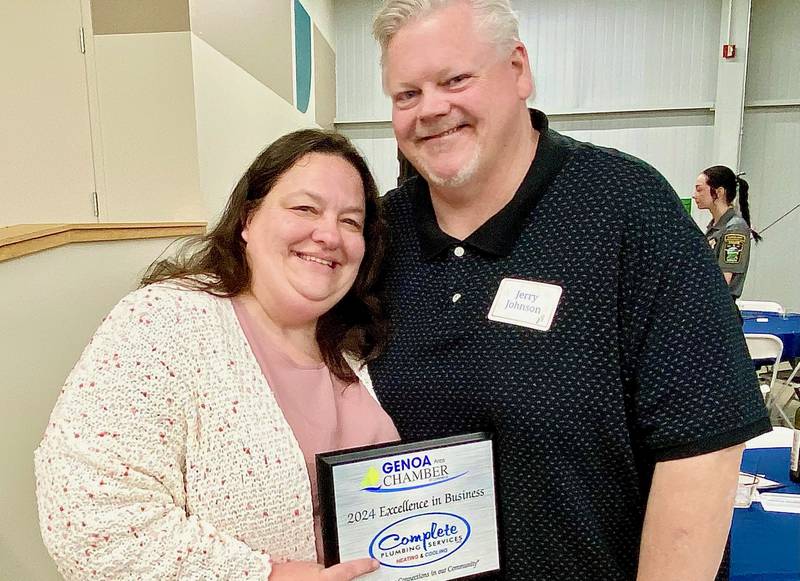 (From left) Tina Johnson and husband Jerry Johnson, owners of Complete Plumbing Services Inc., pose for a photo after receiving the Genoa Area Chamber of Commerce's 2024 Excellence in Business Award on Thursday, Feb. 13, 2025, at the chamber's 68th Annual Meeting and Awards Dinner at Custom Aluminum Products, 312 Eureka St., Genoa.