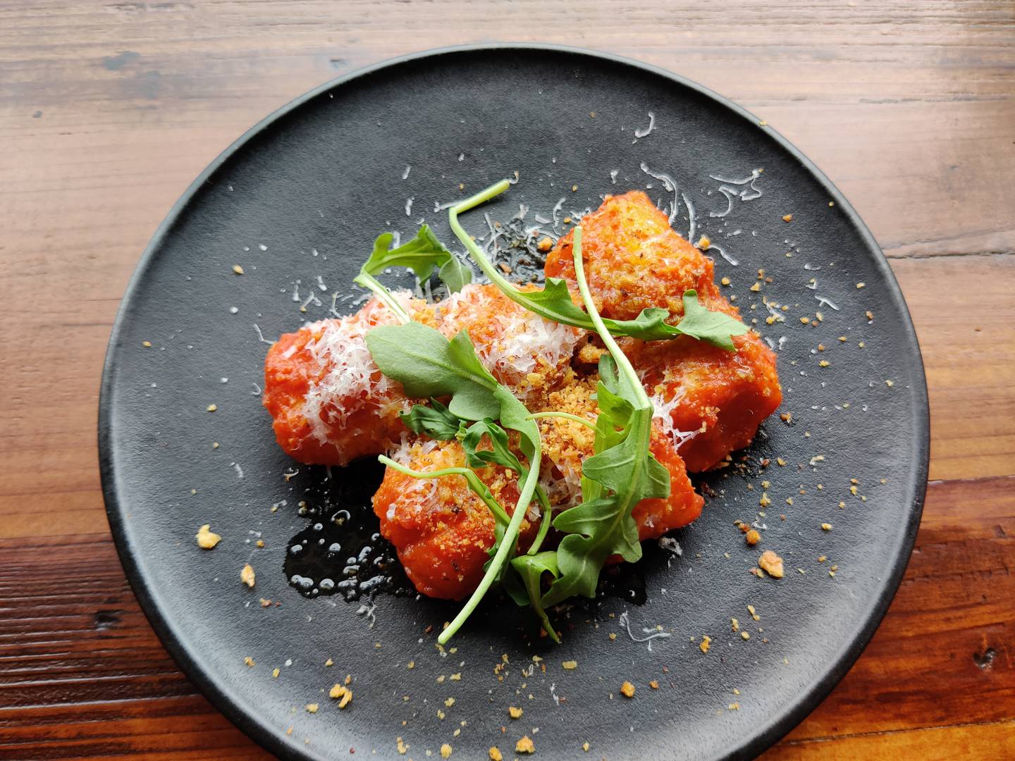Delicate and delectable ricotta dumplings incorporate house-made cheese.at Osteria Bigolaro in Geneva.