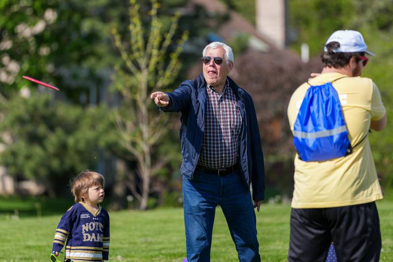 A player throws his disc during the Glen Ellyn Park District Ace Race disc golf event at Maryknoll Park in Glen Ellyn, IL on Saturday May 10th, 2025.  The Ace Race is just one of many events the Glen Ellyn Park District holds throughout the year.