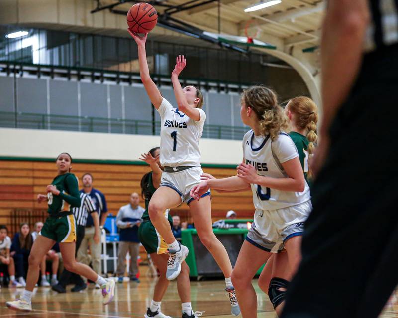 Oswego East's Aubrey Lamberti (1) puts up a lay up at the York Thanksgiving Tournament. Nov 13, 2023.